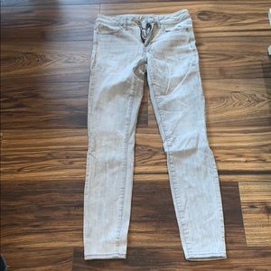 American Eagle bleached grey skinny’s